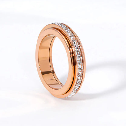 🔥【Compra 1 y llévate 1 gratis】✨Anillo Giratorio con Brillo de Cielo Estrellado para Mujer Lujo Ligero Pareja Acero Titanio