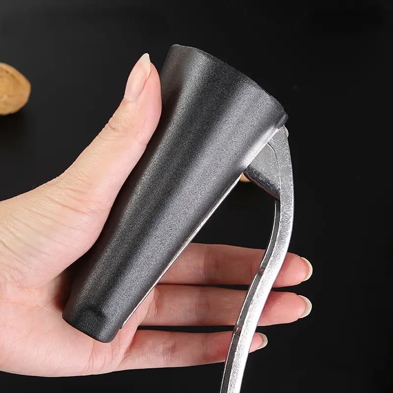 💥【Kúpiť 1 a získať 1 zdarma】Abre nueces multifuncional – rompe cáscaras de nogales, almendras y avellanas con facilidad