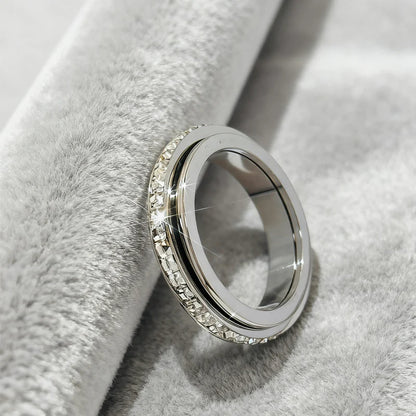 🔥【Compra 1 y llévate 1 gratis】✨Anillo Giratorio con Brillo de Cielo Estrellado para Mujer Lujo Ligero Pareja Acero Titanio